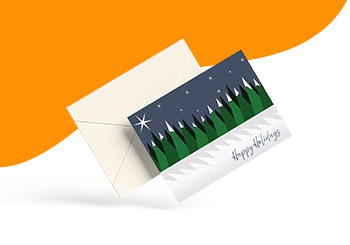 Holiday greeting card with snow-capped trees and envelope for FreeLogoServices Black Friday 2024 offers.