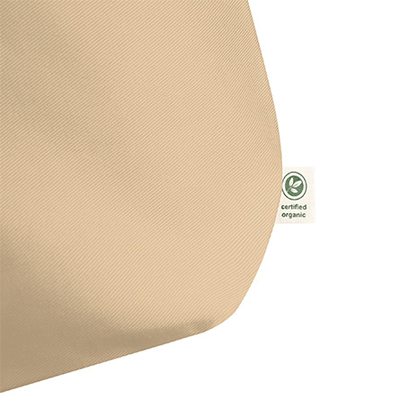 Etiqueta que certifica que el bolso de mano está hecho con material orgánico